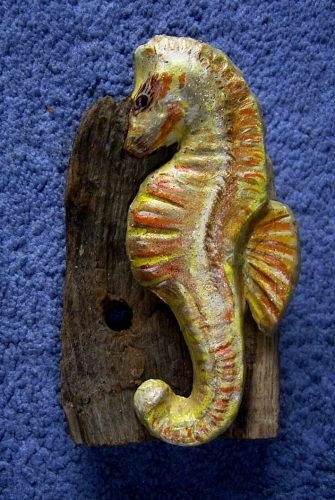 papier mache seahorse on driftwood